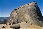 Photo: Hikers on the sub-dome after descending the cables route from the summit of Half Dome, Yosemite National Park, California