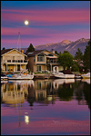 Photo: Full moon rising in evening over homes and boats in the Tahoe Keys, South Lake Tahoe, California