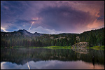 Photo: Lightning bolt strikes the Sierra Buttes during a storm over Packer Lake, California