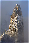 Photo: Morning light, fresh snow, and clearing spring clouds on Higher Cathedral Spire, Yosemite Valley, Yosemite National Park, California
