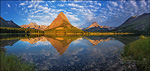 Photo: Grinnell Point reflected in Swiftcurrent Lake, Glacier National Park, Montana