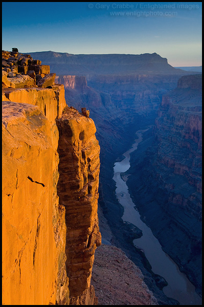 Photo: Golden sunrise light on sheer cliff wall high above the Colorado River, Toroweap Overlook, North Rim, Grand Canyon National Park, Arizona