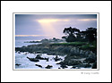 Sunbeam sun rays through coastal fog over Monterey, Monterey Coast, California
