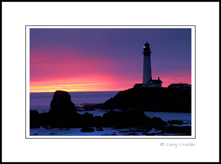 Storm clouds at sunset at Pigeon Point Lighthouse, San Mateo County Coast, California