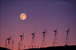 picture: Moon over wind turbine clean energy windmills, Altamont Pass, Alameda County, California