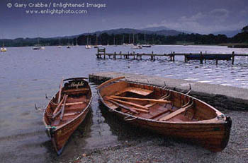 Evening light over wooden boats at Ambelside, Lake Windemere, Lakes District National Park, Cumbria, England
