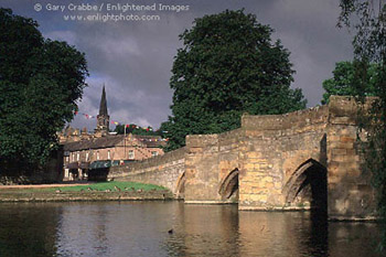 Sunrise light on stone bridge across the Wye River at Bakewell, Peak District National Park, England