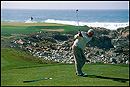 Picture: Golfer teeing off along the coast, Monterey Peninsula, California