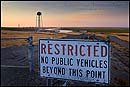 Photo: Restricted Access sign along the California Aquaduct, in the Central Valley, near Los Bano, Merced County, California