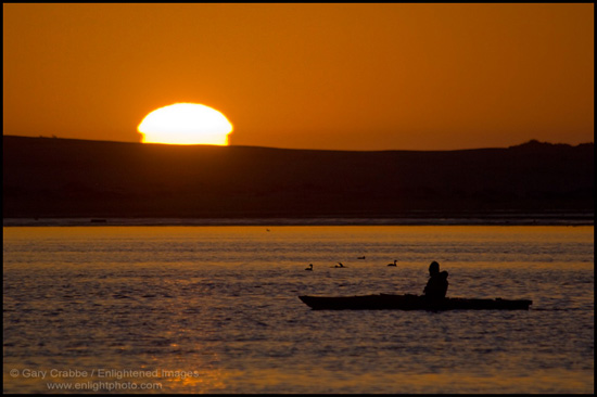 Picture: Kayaker watching the sunset, Morro Bay, California