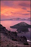 Picture: Crater Lake, Wizard Island, red, sunset, alpenglow, storm, stormy, storm clouds, dramatic, colorful, sunset, crater, lake, water, island, volcanic, volcano, rim