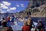 Picture: Sightseeing tourist cruising on a boat ride around Crater Lake, Crater Lake National Park, Oregon