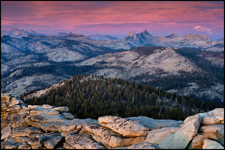 Picture: Alpenglow on clouds at sunset over the Cathedral Range, from the summit of Clouds Rest, Yosemite National Park, California