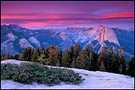 Picture: Alpenglow on clouds at sunset above Half Dome and Tenaya Canyon, Yosemite National Park, California