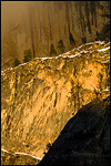 Picture: Cloud and trees on rocky ledge of cliff on Half Dome at sunset, Yosemite National Park, California