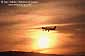 Small plane  flying at sunset over Contra Costa County, California