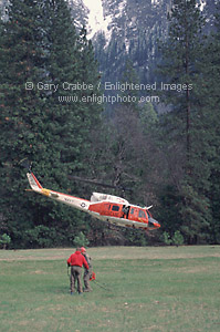 Rescue helicopter on floor of Yosemite Valley, Yosemite National Park, California