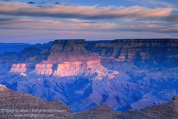 Sunrise light through clouds on North Rim of Grand Canyon, Grand Canyon National Park, Arizona