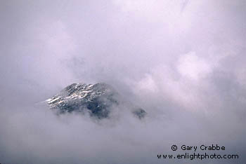 Storm clouds and mountain peak, near Whistler, Sea-to-Sky Road, British Columbia, Canada