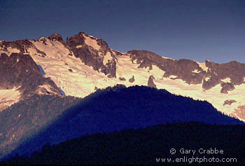 Sunrise light on the Tantalus Mountain range above Brackendale, Sea-to-Sky Road, near Squamish, British Columbia, Canada