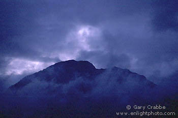 Evening storm clouds over mountain peak near Squamish, British Columbia, Canada