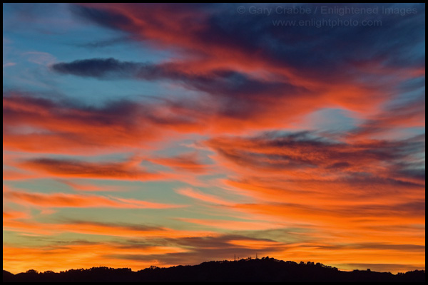 Photo: Red and orange clouds at sunset over the East Bay Hills, near Orinda, California