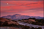 Picture: Moon and red clouds at sunset over Mount Diablo from Lafayette, California