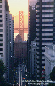 Sunrise over the Bay Bridge seen through the Financial District, San Francisco, California