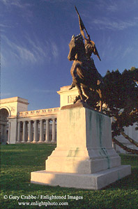 Statue at sunrise in front of the Palace of Legion of Honor, Lincoln Park, San Francisco, California