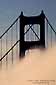 Fog and Golden Gate Bridge at sunrise, from the Marin Headlands, California