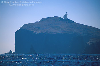 Photo: Lighthouse and steep cliffs of Anacapa Island, Channel Islands National Park, Southern California Coast