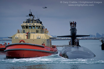 Los Angeles Class attack submarine being pushed into port, US Naval Submarine Base at Point Loma, San Diego, California