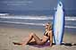 Woman sunbathing on the beach in Southern California