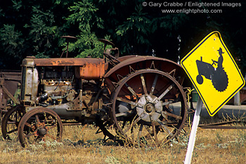 Tractor and tractor crossing road sign Ukiah, Mendocino County, California