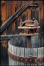 Photo: Wooden wine press and barn door at Foxen Winery and Vineyards, along Foxen Canyon Road, Santa Barbara County, California