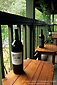 Wine bottles on deck at Cyrus Estate Vineyard tasting room, Alexander Valley, Sonoma County, California
