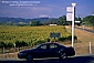 Sign points to wineries, driving along the backroads of the Alexander Valley, Sonoma County, California