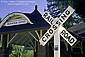 Railroad crossing sign at Kenwood Train Depot station, Sonoma Valley, California