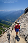Female hiker hiking up trail to top of  Moro Rock, Sequoia National Park, California