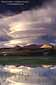 Lenticular cloud over alpine tarn in Tuolumne Meadows, Yosemite National Park, California