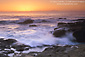 Waves breaking on coastal rocks at sunset, Point Lobos State Reserve, Monterey County, California