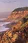 Sunset light on coastal cliffs at Leffingwell landing, near Cambria, California