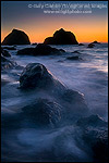 Picture: Sunset light over seastacks and coastal rocks on beach at False Klamath Cove, Redwood National Park, California