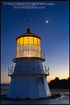 Picture: Crescent Moon over owl on the Cape Mendocino Lighthouse in evening light, Shelter Cove, Lost Coast, Humboldt County, California