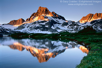 Alpenglow at sunrise on Banner Peak reflected in 1000 Island Lake, Ansel Adams Wilderness, Eastern Sierra, California