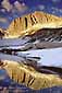 Sunrise light on North Peak mountain reflected in alpine lake, Nine Lakes Basin, Hoover Wilderness, near Yosemite National Park, California