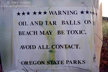 Environmental toxics warning sign at coastal beach, Fort Stevens State Park, near Astoria, Northern Oregon Coast