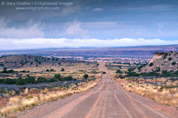 Picture: Dirt road through the high desert plateau at Canyonlands National Park, Utah