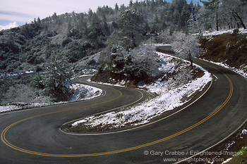 Photo: twisting wet sharp curves on mountain road, Mount Hamilton, Santa Clara County, California