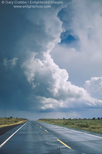 Photo: Thunderstorm cloud over rain covered asphalt road through the high desert, Coconino Plateau, Arizona